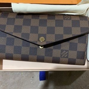 Am selling my Louie Vuitton wallet brand new